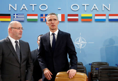 Georgian Defence Minister Levan Izoria (L) and NATO Secretary-General Jens Stoltenberg attend a NATO-Georgia defence ministers meeting at the Alliance headquarters in Brussels, Belgium February 16, 2017. REUTERS/Francois Lenoir