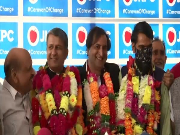 JKPC's Chairman Sajad Gani Lone welcoming Haji Farooq Ahmad Mir and other leaders (Photo/ANI)