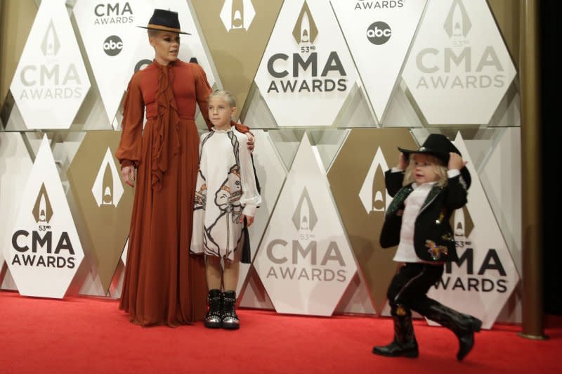 Pink (L), her daughter Willow and son Jameson arrive for the Country Music Association Awards in Nashville in 2019. File Photo by John Angelillo/UPI