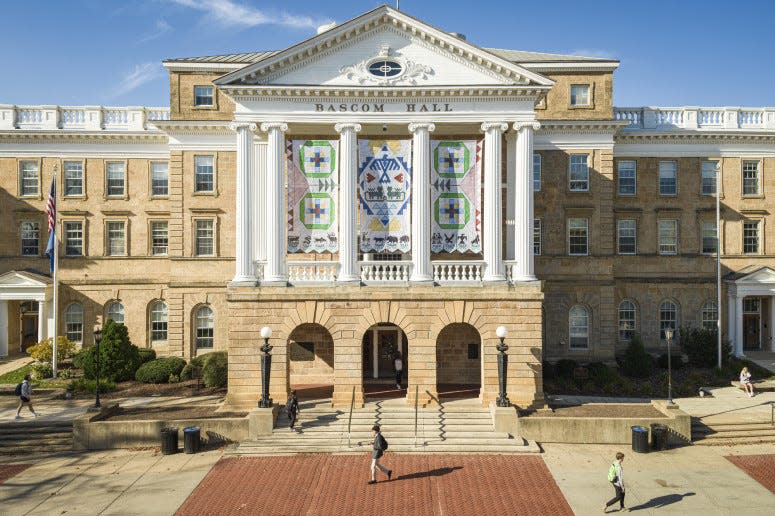 UW-Madison hung Ho-Chunk banners on Bascom Hall last month, commissioned as part of the university’s 175th anniversary. UW-Madison occupies land that was the ancestral home of the Ho-Chunk.