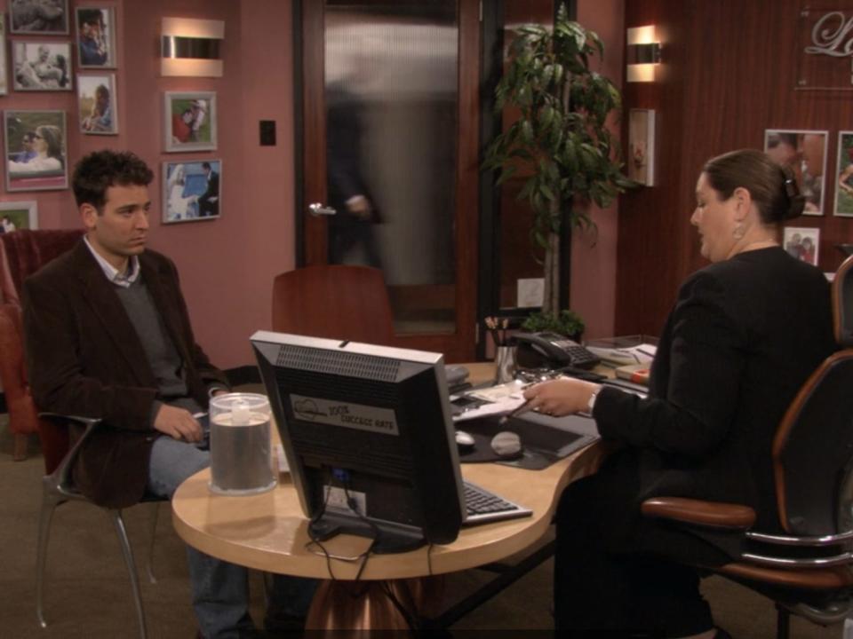 ted talking to someone in an office on how i met your mother
