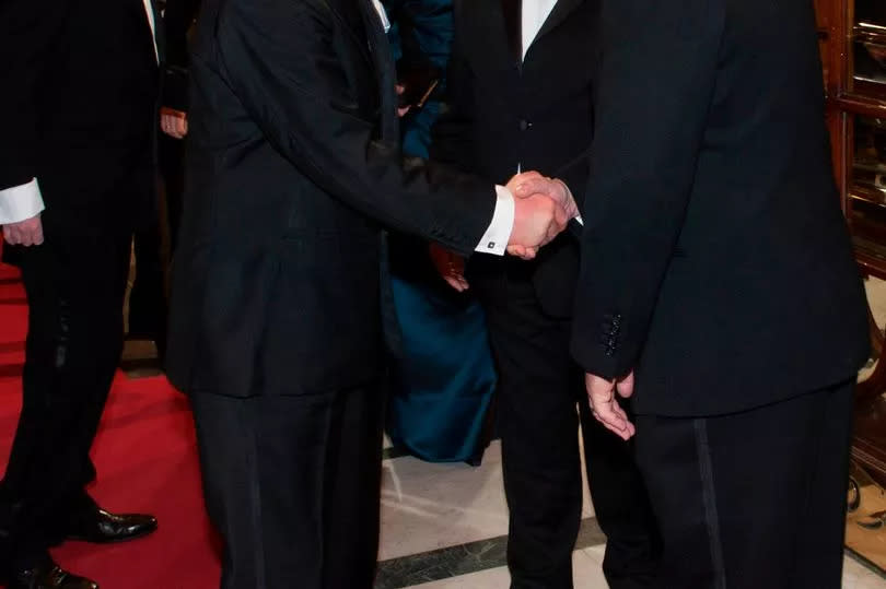 Giles Cooper with King Charles at the Royal Variety Performance in 2013