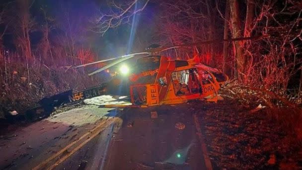 PHOTO: Four people are alive after a medical helicopter that was transporting a patient crashed in Macon County, North Carolina, on Thursday, March 9, 2023. (Facebook / Macon County North Carolina 911)