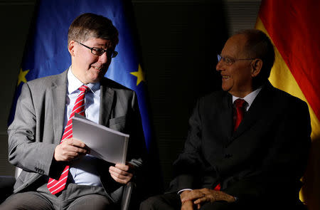 German parliamentary armed forces ombudsman Hans-Peter Bartels, whose job is to hear soldiers’ complaints, presents his annual report on the state of the German military to German Bundestag President Wolfgang Schaeuble in Berlin, Germany, February 20, 2018. REUTERS/Axel Schmidt