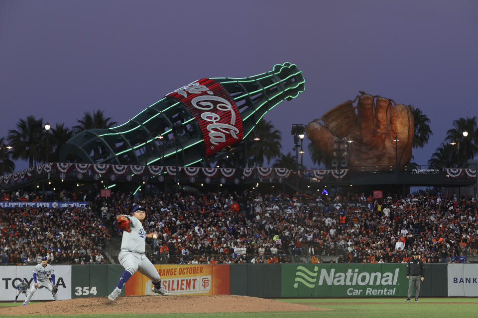 Los Angeles Dodgers' Julio Urias pitches against the San Francisco Giants during the second inning of Game 2 of a baseball National League Division Series Saturday, Oct. 9, 2021, in San Francisco. (AP Photo/John Hefti)