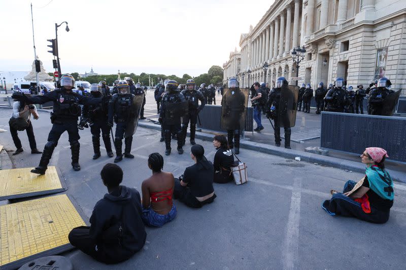 Fourth night of riots after teenager shot dead by police in Paris suburb