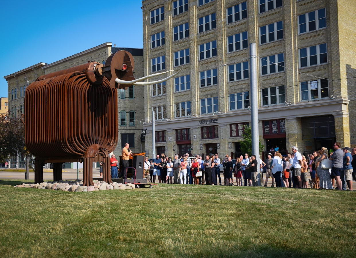 Rusty, a mastodon built largely from an old shoe-factory boiler, now permanently resides near 150 W. St. Paul Ave. in Milwaukee's Third Ward.