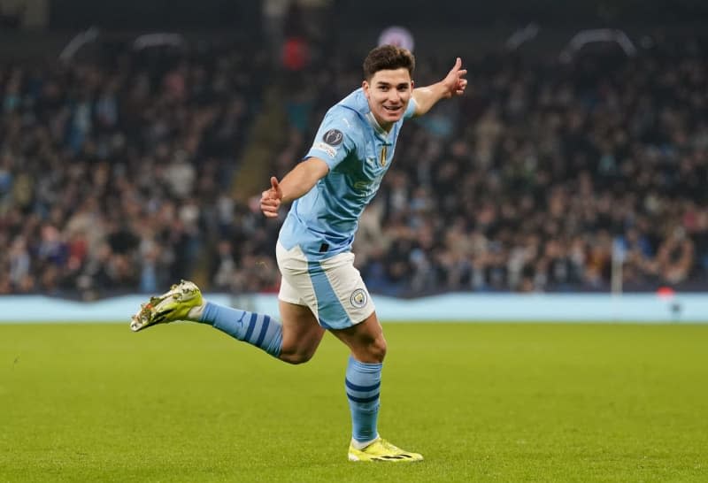 Manchester City's Julian Alvarez celebrates scoring his side's second goal during the UEFA Champions League round of 16 second leg soccer match between Manchester City and FC Copenhagen at the Etihad Stadium. Nick Potts/PA Wire/dpa