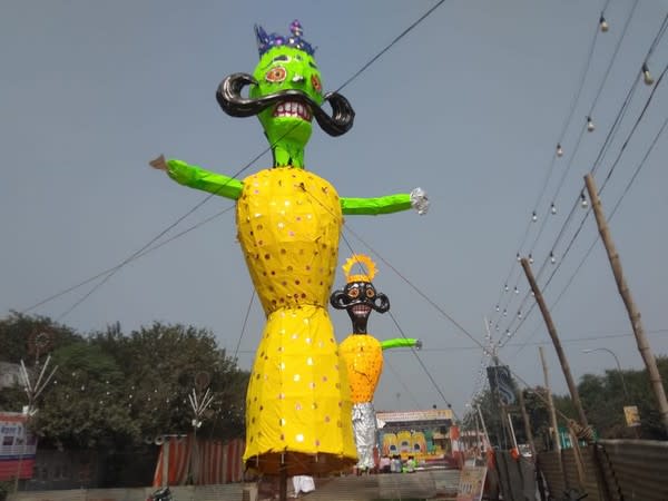 Effigy of coronavirus standing along with Ravan effigy in Shashtri Park, New Delhi. (Photo/ANI)