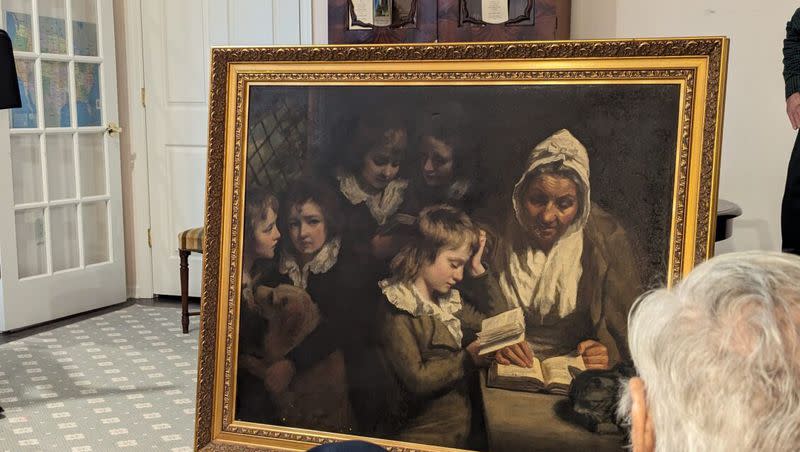 Dr. Francis Wood, 96, admires the John Opie painting, “The Schoolmistress,” stolen from his parents’ Newark, New Jersey, home in 1969 and recently returned to him as the rightful owner. 