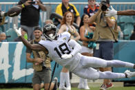 Jacksonville Jaguars wide reciever Laquon Treadwell (18) reaches but can't make the catch on a pass during the first half of an NFL football game against the Denver Broncos, Sunday, Sept. 19, 2021, in Jacksonville, Fla. (AP Photo/Phelan M. Ebenhack)