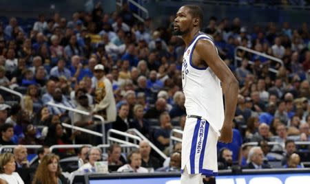 Dec 1, 2017; Orlando, FL, USA;Golden State Warriors forward Kevin Durant (35) looks on as he walks off the court after he was ejected against the Orlando Magic during the second half at Amway Center. Mandatory Credit: Kim Klement-USA TODAY Sports