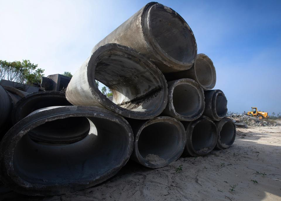 Concrete elliptical pipes are seen at the Bay County Roads and Bridges facility in Panama City. The material will be placed in about 75 feet of water in the Gulf of Mexico in coordination with the University of Florida's Institute of Food and Agricultural Sciences to create habitat for marine life.