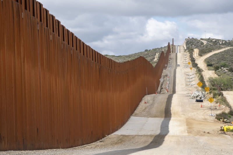 CBP agents heard the woman yelling for assistance multiple times before she finally fell from the fence 23 minutes after she was first located and became stuck, with firefighters getting to her body approximately 10 minutes later before a physician declared her deceased over the phone. File Photo by Pat Benic/UPI