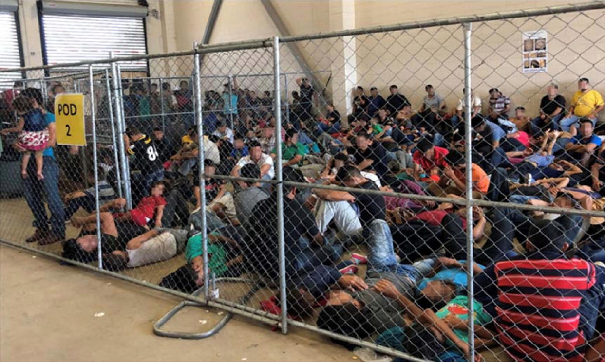 An overcrowded fenced area holding families at a Border Patrol station is seen in a still image from video in McAllen, Texas, U.S. on June 10, 2019 and released as part of a report by the Department of Homeland Security's Office of Inspector General on July 2, 2019. Picture pixelated at source. (Photo: Office of Inspector General/DHS/Handout via Reuters)