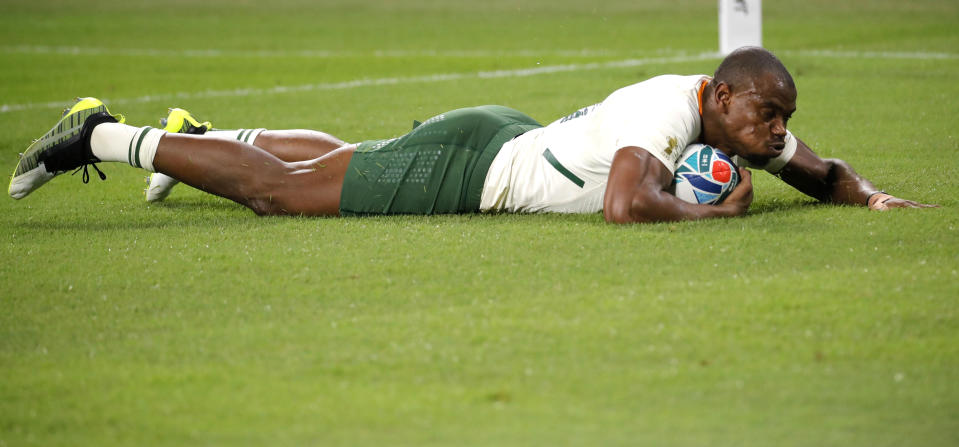 South Africa's Makazole Mapimpi reacts after scoring a try during the Rugby World Cup Pool B game at the City of Toyota Stadium between South Africa and Namibia in Toyota City, Japan, Saturday, Sept. 28, 2019. (AP Photo/Christophe Ena)