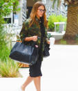 <p>Bump in the road! The <span>mom-to-be</span> has her arms full with the Anya Hindmarch <span>Ebury Smiley Large Shopper Bag</span> ($995) — which matches her black knee-length dress and camo jacket — while out in L.A. on Aug. 25. <strong>Finish the Look!</strong> Liu & Qu Knee-Length Maternity Dress ($13 to $16), <span>amazon.com</span>; Escalier Women's Military Camo Jacket ($24 to $30), <span>amazon.com</span></p>