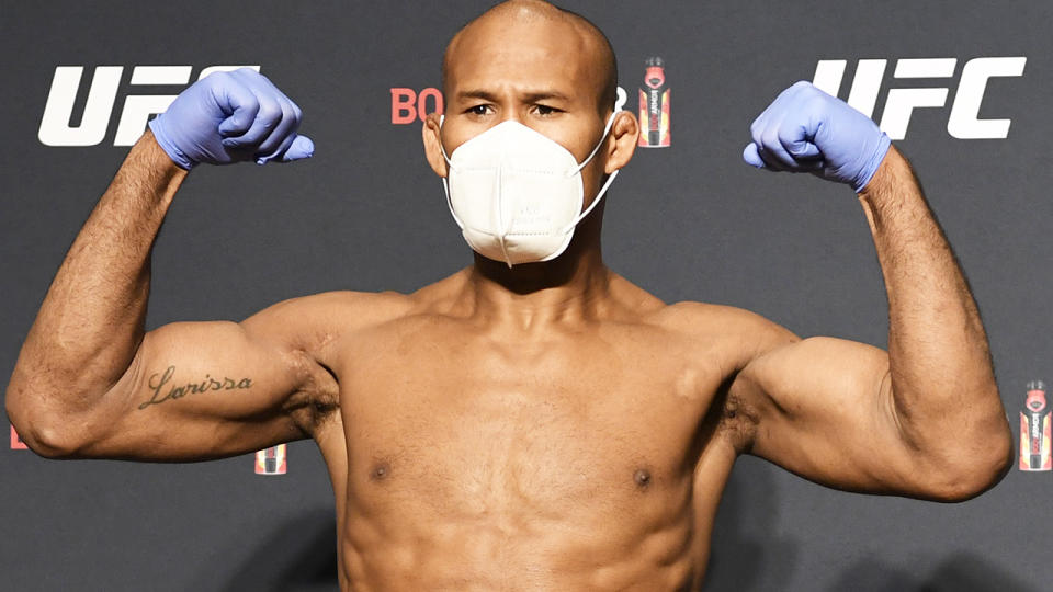 Ronaldo 'Jacare' Souza is pictured wearing a mask and gloves at the weigh-in for UFC 249.