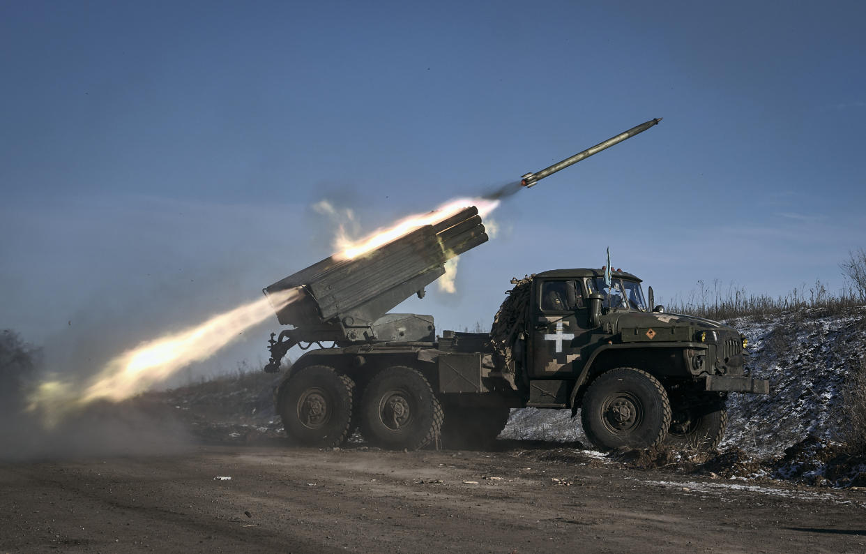 A Ukrainian army Grad multiple rocket launcher fires a rocket.