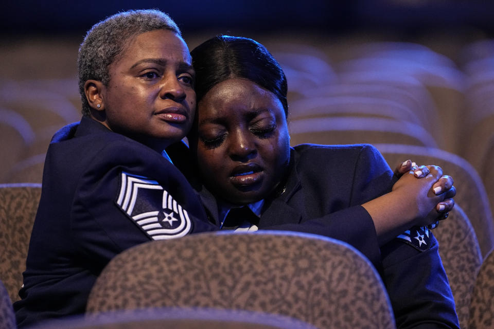 U.S. Air Force personnel stand near the coffin of slain airman Roger Fortson during his funeral at New Birth Missionary Baptist Church, Friday, May 17, 2024, near Atlanta. (AP Photo/Brynn Anderson)