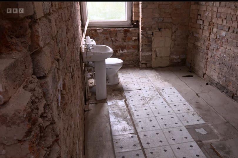 The stripped back bathroom of the mid-terrace in Bucknall
