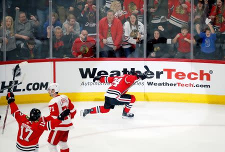 Feb 10, 2019; Chicago, IL, USA; Chicago Blackhawks center Dominik Kahun (24) celebrates his goal against the Detroit Red Wings during the third period at United Center. Mandatory Credit: Jon Durr-USA TODAY Sports