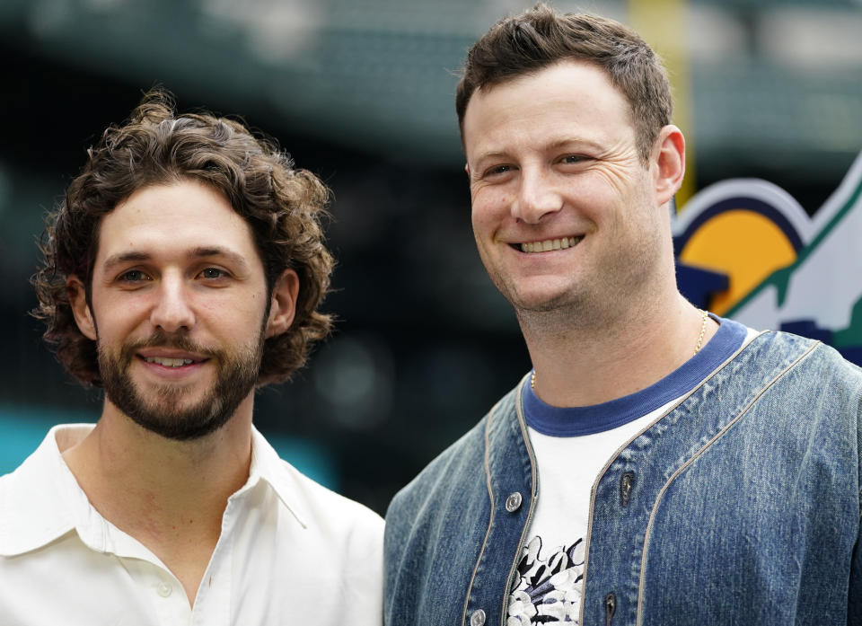 National League starting pitcher Zac Gallen, of the Arizona Diamondbacks, left, and American League starting pitcher Gerrit Cole, of the New York Yankees, pose for a photo following a press conference, Monday, July 10, 2023, in Seattle. The All-Star Game will be played Tuesday, July 11. (AP Photo/Lindsey Wasson)