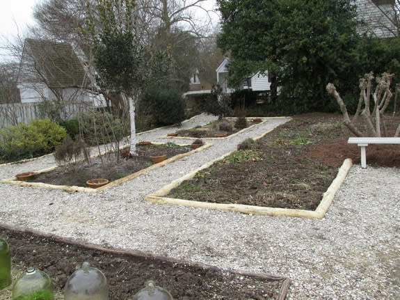 A section of the Colonial Garden edged with locust poles.