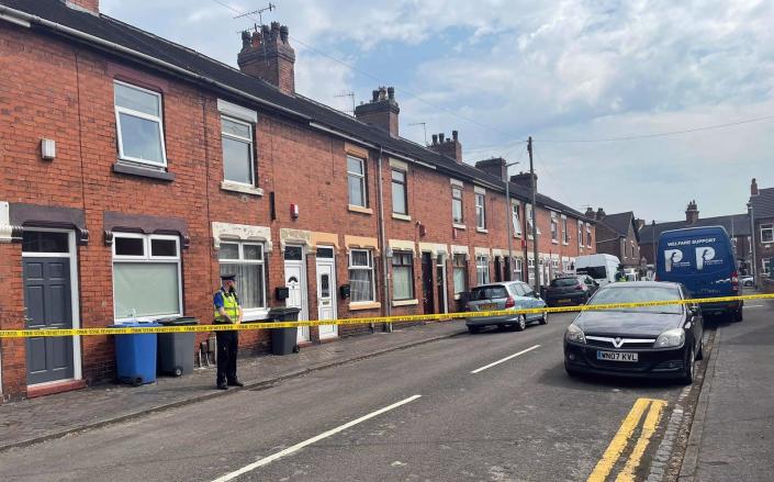 Flax Street in Stoke-on-Trent where the seven-year-old girl and 11-year-old boy were found - STEPHANIE WAREHAM/PA