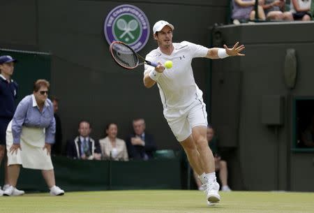 Andy Murray of Britain hits a shot during his match against Robin Haase of the Netherlands at the Wimbledon Tennis Championships in London, July 2, 2015. REUTERS/Henry Browne