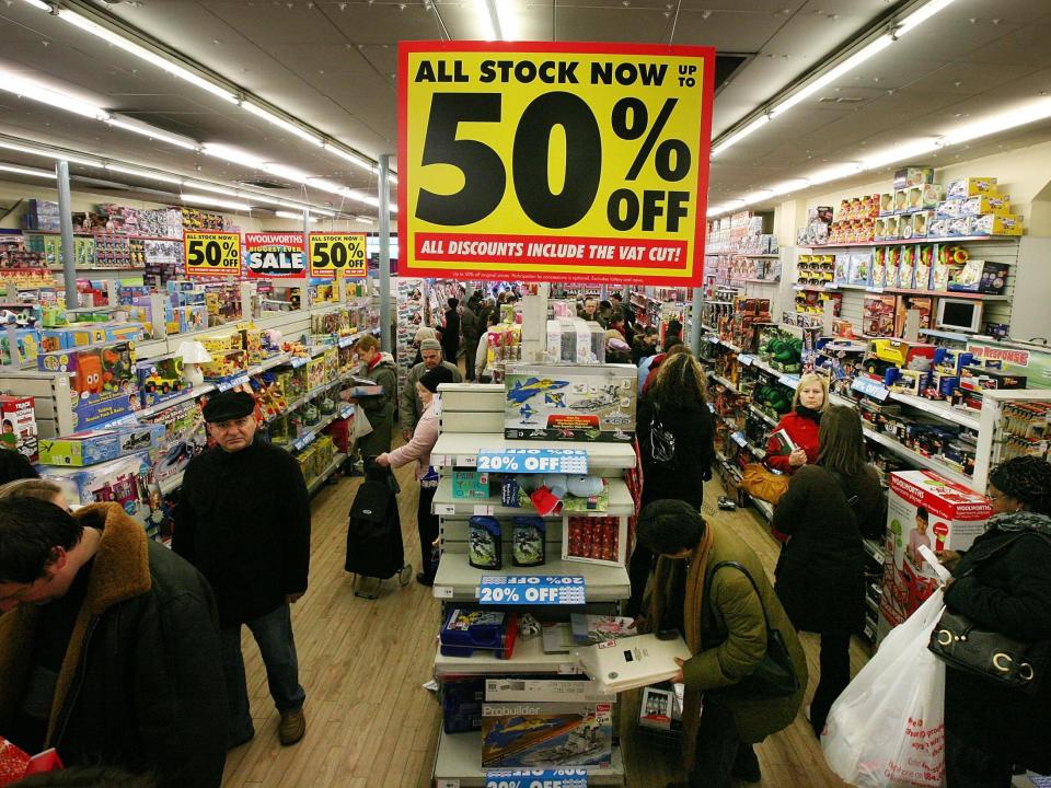 Customers shop in a branch of Woolworths in Camden on 5 December 2008Peter Macdiarmid/Getty