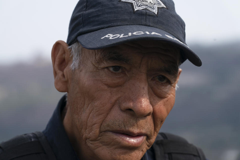 Nefi de Aquino, a police officer who keeps an eye on the activity of the Popocatépetl volcano for scientists, speaks during an interview in Santiago Xalitzintla, Mexico, Thursday, 25 May, 2023. For nearly three decades, De Aquino says he has been “taking care of” the volcano affectionately known as “El Popo.” (AP Photo/Marco Ugarte)