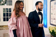 <p>Pregnant <a href="https://people.com/tag/chrissy-teigen/" rel="nofollow noopener" target="_blank" data-ylk="slk:Chrissy Teigen;elm:context_link;itc:0;sec:content-canvas" class="link ">Chrissy Teigen</a> and <a href="https://people.com/tag/john-legend/" rel="nofollow noopener" target="_blank" data-ylk="slk:John Legend;elm:context_link;itc:0;sec:content-canvas" class="link ">John Legend</a> make their arrival to the White House state dinner for French President Emmanuel Macron in Washington, D.C., on Dec. 1. </p>