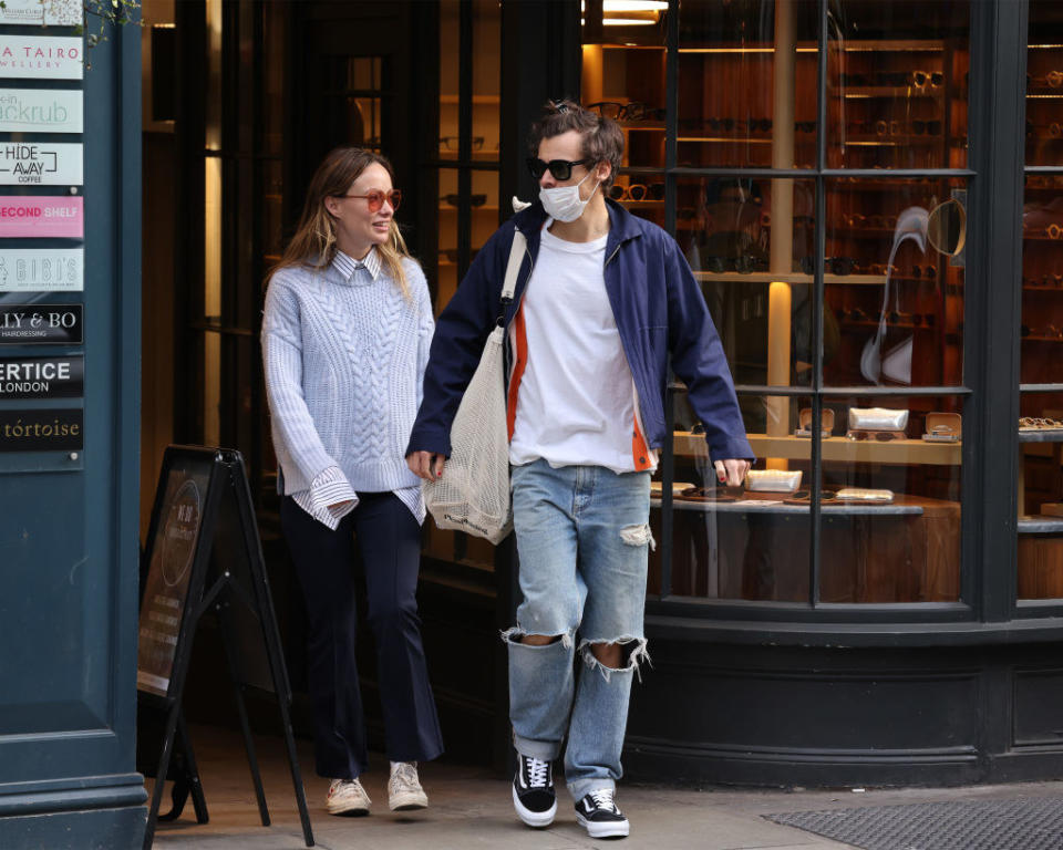 the couple walking down the street