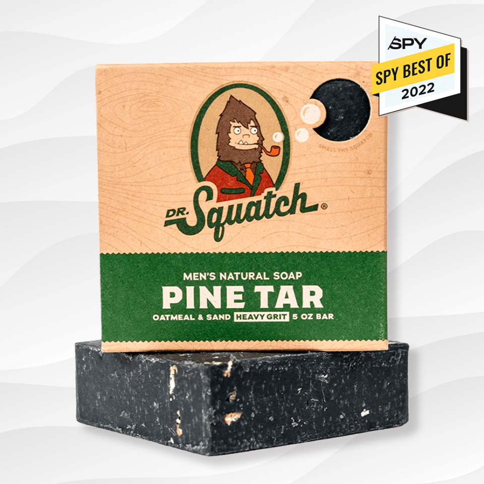 the dr squatch natrual pine tar soap bar against a white wavy background