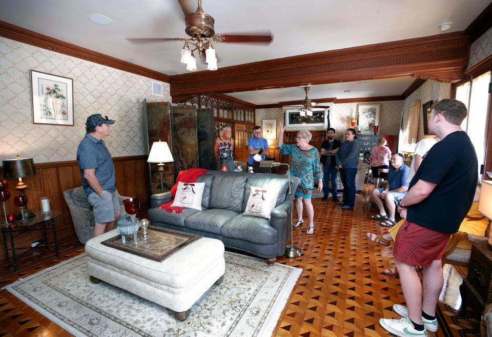 In this 2022 file photo, guests take a tour of the Stetson Mansion. The historical tours ended in April, but the owners said the mansion would reopen each holiday season for the Christmas Spectacular.