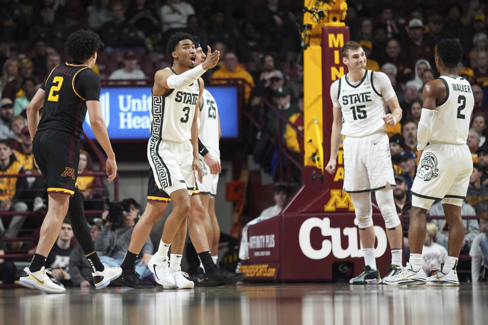 Michigan State guard Jaden Akins (3) gestures toward a referee during the second half of the team's NCAA college basketball game against Minnesota, Tuesday, Feb. 6, 2024, in Minneapolis. (AP Photo/Abbie Parr)