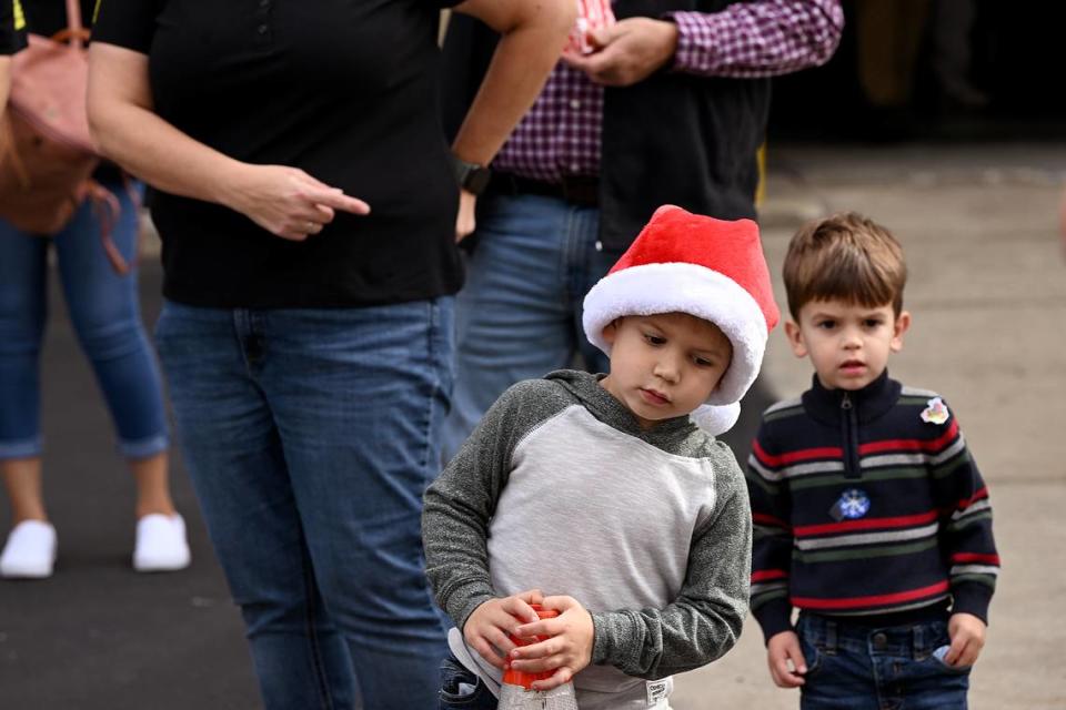 Children wait for the arrival of Santa in a Monster Truck at the 38th annual Flight to the North Pole program for children with disabilities and terminal illnesses at Feld Entertainment in Palmetto.