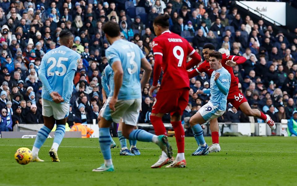 Liverpool's Trent Alexander-Arnold scores their first goal