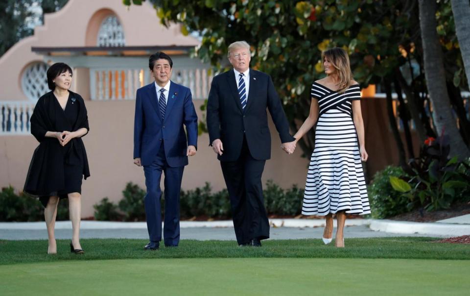 The four arriving at the President's resort in Florida (REUTERS)