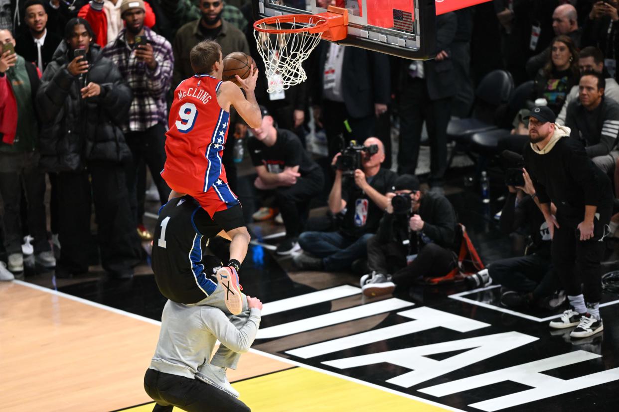 Basketball player Mac McClung, of the Philadelphia 76ers, competes during the Slam Dunk Contest of the NBA All-Star week-end in Salt Lake City, Utah, February 18, 2023. (Photo by Patrick T. Fallon / AFP) (Photo by PATRICK T. FALLON/AFP via Getty Images)