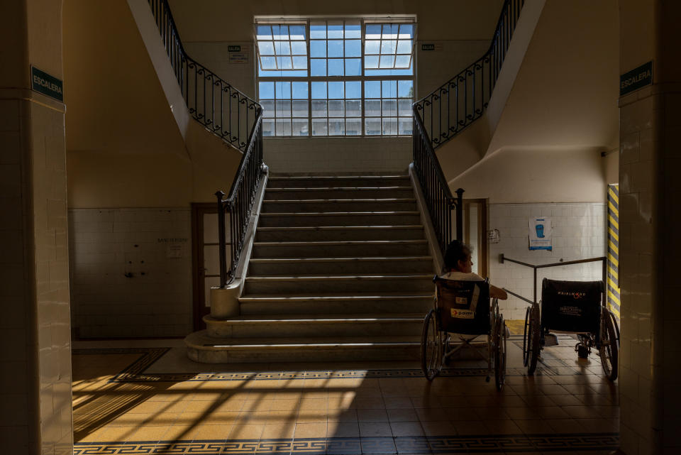 A patient gets some fresh air in the hallway of Koch Pavilion, a hospital unit that is exclusively used by tuberculosis patients at the Muniz public hospital, in Buenos Aires, Argentina Feb. 5, 2019. Patricia Figueroa, a social worker at the Muniz public hospital, said the facility was struggling with overcrowding as it faced a growing number of TB patients, which she described as "a record in recent history". (Photo: Magali Druscovich/Reuters)