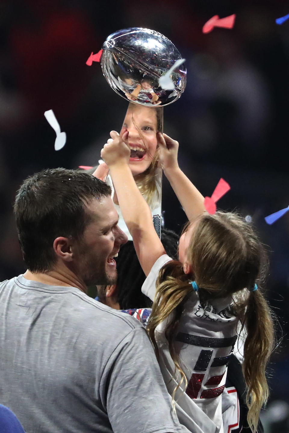 <p>Tom Brady #12 of the New England Patriots and Vivian Lake Brady celebrate with the Vince Lombardi trophy after the teams 13-3 win over Los Angeles Rams during Super Bowl LIII at Mercedes-Benz Stadium on February 03, 2019 in Atlanta, Georgia. (Photo by Streeter Lecka/Getty Images) </p>