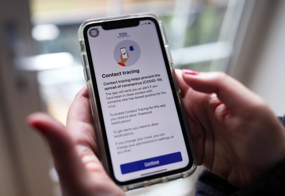 The new coronavirus contact tracing app on an iPhone, which was launched across England and Wales on Thursday morning. (Photo by Yui Mok/PA Images via Getty Images)