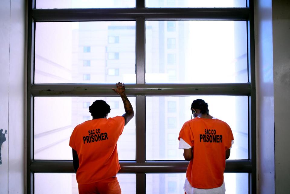 Inmates hang out at the main jail in downtown Sacramento.