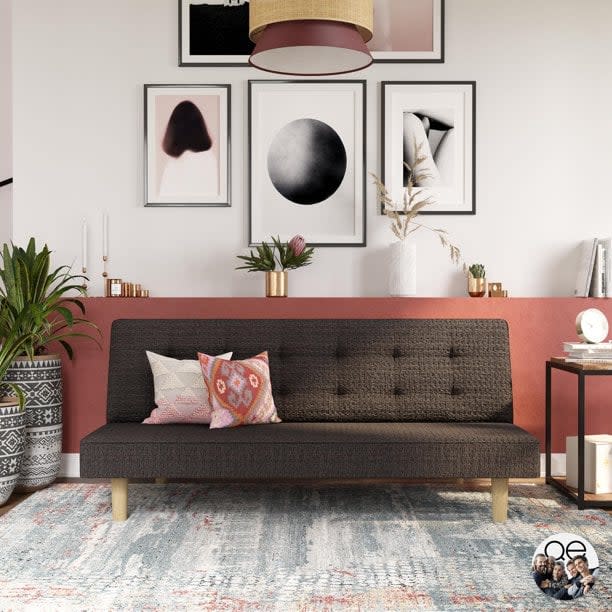 <p>The linen upholstered <span>Queer Eye Tamlin Futon</span> ($235) was dreamt up by the Fab Five. It features legs boasting a natural wood grain finish that lends itself to a variety of home design styles.<br><strong>What We love:</strong></p> <ul> <li>This futon is super easy to assemble - and the tufted backrest is bound to earn you compliments from houseguests.</li> </ul> <p> <strong>Who it's best for:</strong></p> <ul> <li>This is best for someone looking for an easy-to-put-together seating arrangement that works as a bed in a pinch.</li> </ul> <p> <strong>Who should avoid it:</strong></p> <ul> <li>Some reviewers are disappointed that the groove in the middle is somewhat uncomfortable to sleep on as a bed, but a topper may help.</li> </ul> <p><strong>The Details:</strong> <strong>Width:</strong> 69" | <strong>Height:</strong> 28.5" | <strong>Depth:</strong> 30" | <strong>Upholstery:</strong> Linen| <strong>Color Options:</strong> 4</p>