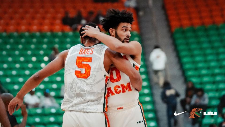 Florida A&M University guard Dimingus Stevens greets teammate, forward Jaylen Bates during game against Mississippi Valley State University at the Lawson Center, Tallahassee, Florida, Monday, Jan. 16, 2023