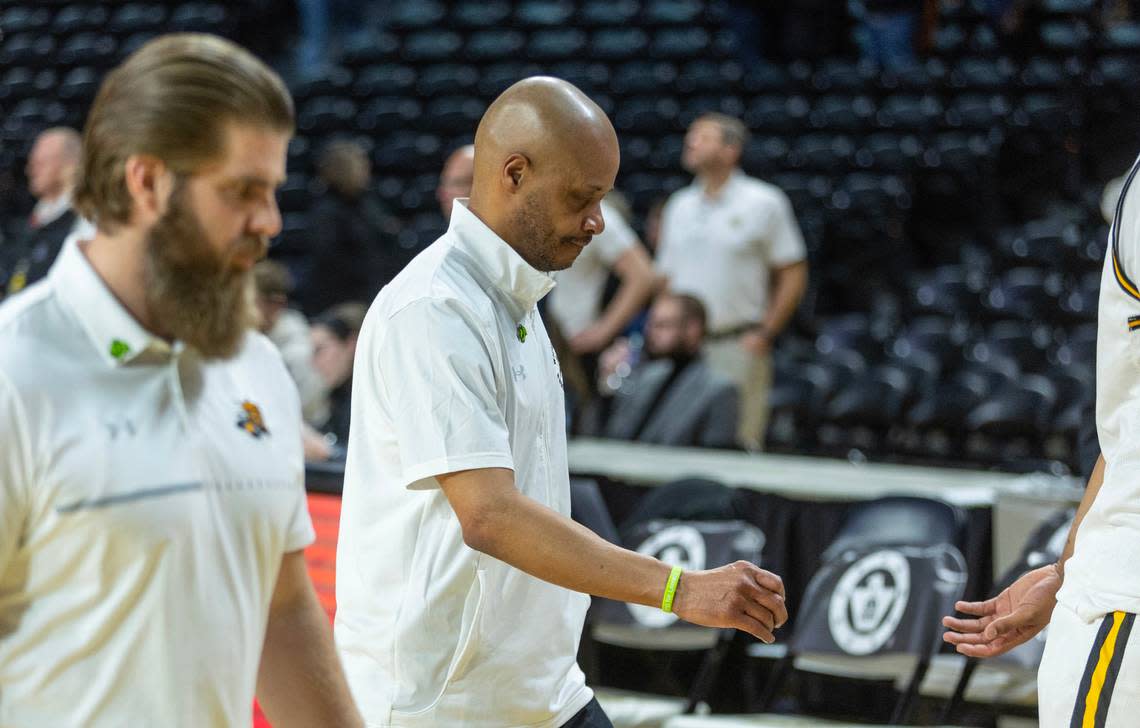 Wichita State coach Isaac Brown walks off the court after the Shockers squandered an 11-point second half lead to lose 72-67 to Central Florida.