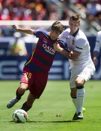 Football - FC Barcelona v Manchester United - International Champions Cup Pre Season Friendly Tournament - Levi's Stadium, Santa Clara, California, United States of America - 25/7/15 Manchester United's Morgan Schneiderlin (R) in action with Barcelona's c Action Images via Reuters / Mark Avery Livepic