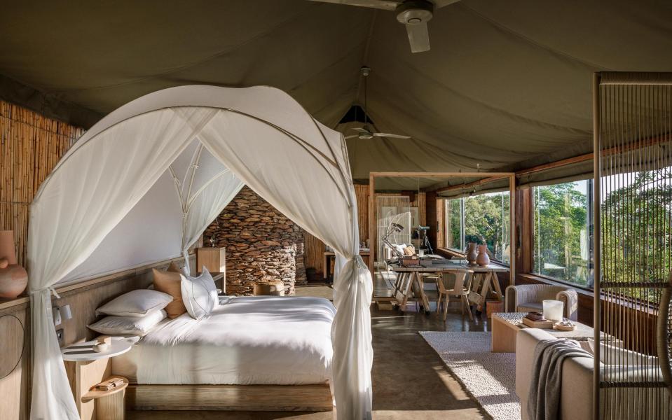 The bedroom in a Tented Suite With Private Pool at Singita Faru Faru Lodge in Tanzania